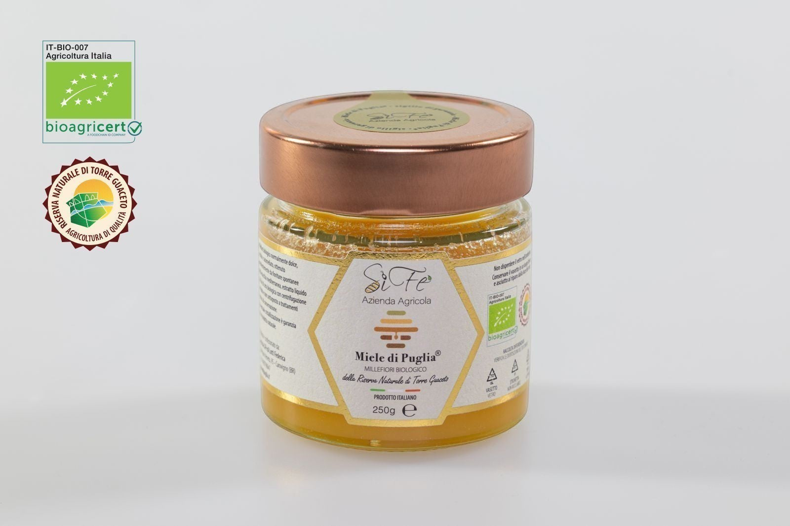 Vasetto di Miele Millefiori Biologico di Puglia Agricolasifè dal colore dorato, prodotto artigianale in vetro da 250g.