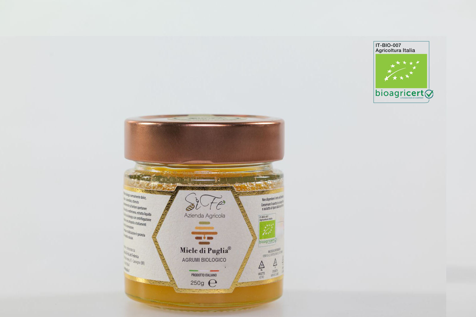 Vasetto di miele biologico di agrumi Agricolasifè, prodotto artigianale pugliese in vasetto di vetro da 250g.